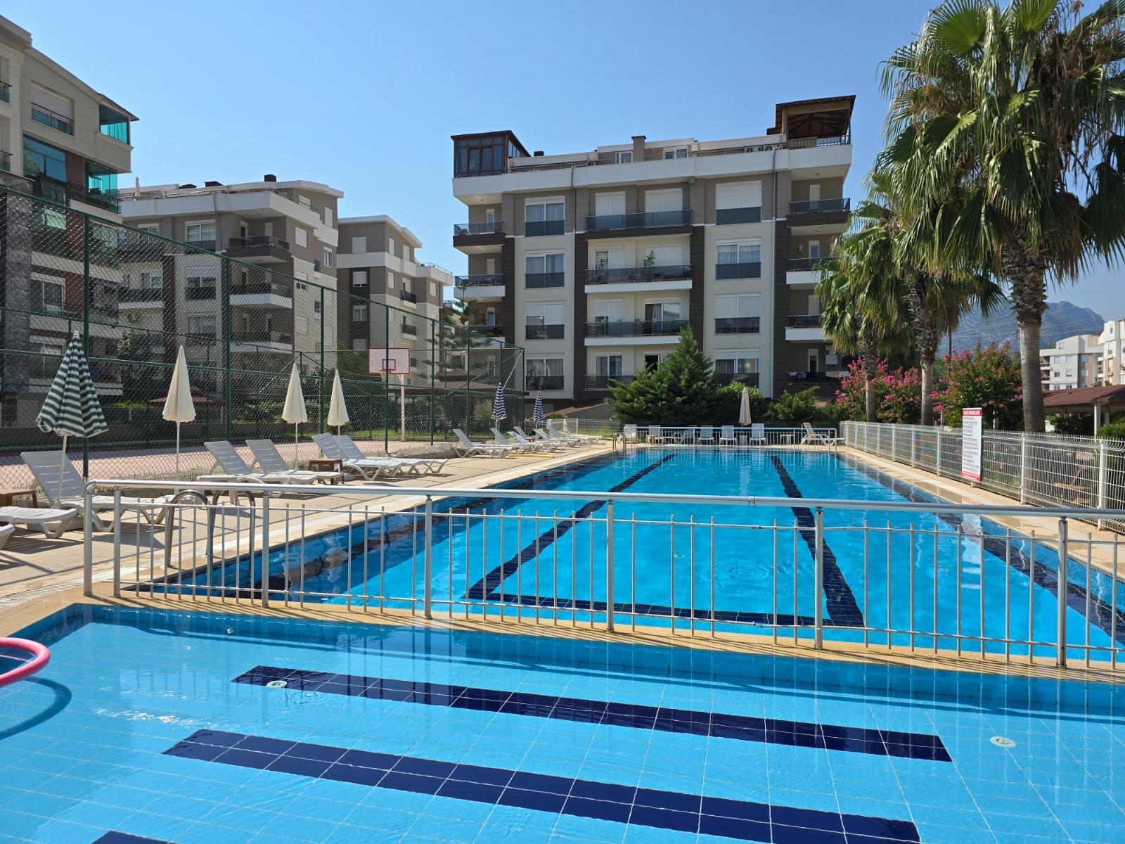 BÖLGENİN EN BÜYÜK AİLE SİTESİNDE GÜVENLİKLİ 2+1 ISITMALI DAİRE